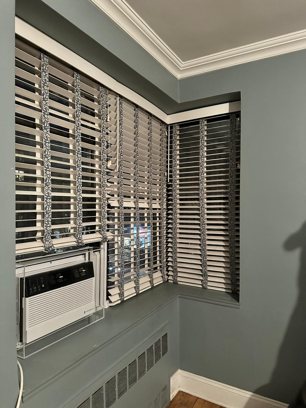 Insulation behind shades for Corner Windows